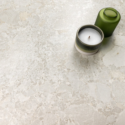 Essentials Terrazzo Stone Blanca 60x120 porcelain tile surface, fine terrazzo-style stone fragments with subtle tonal variation